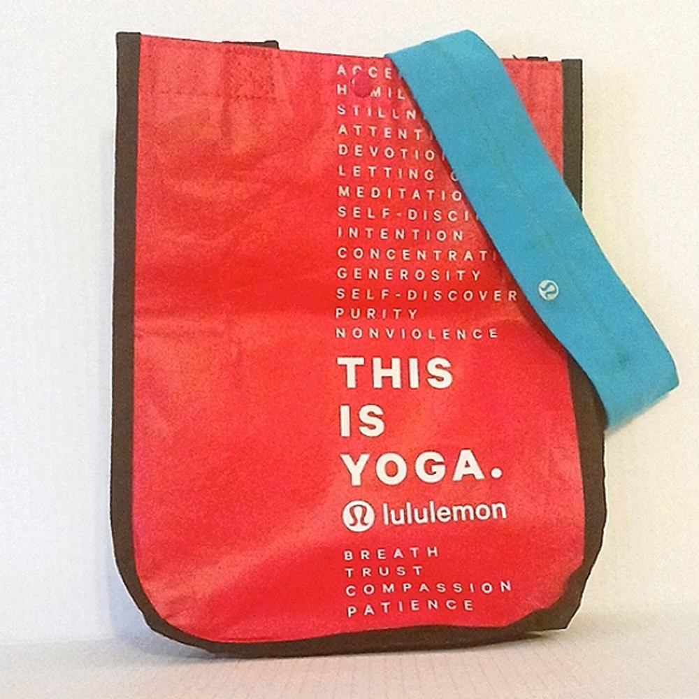 EUC LULULEMON BLACK/RED BAG WITH TURQUOISE HEADBAND